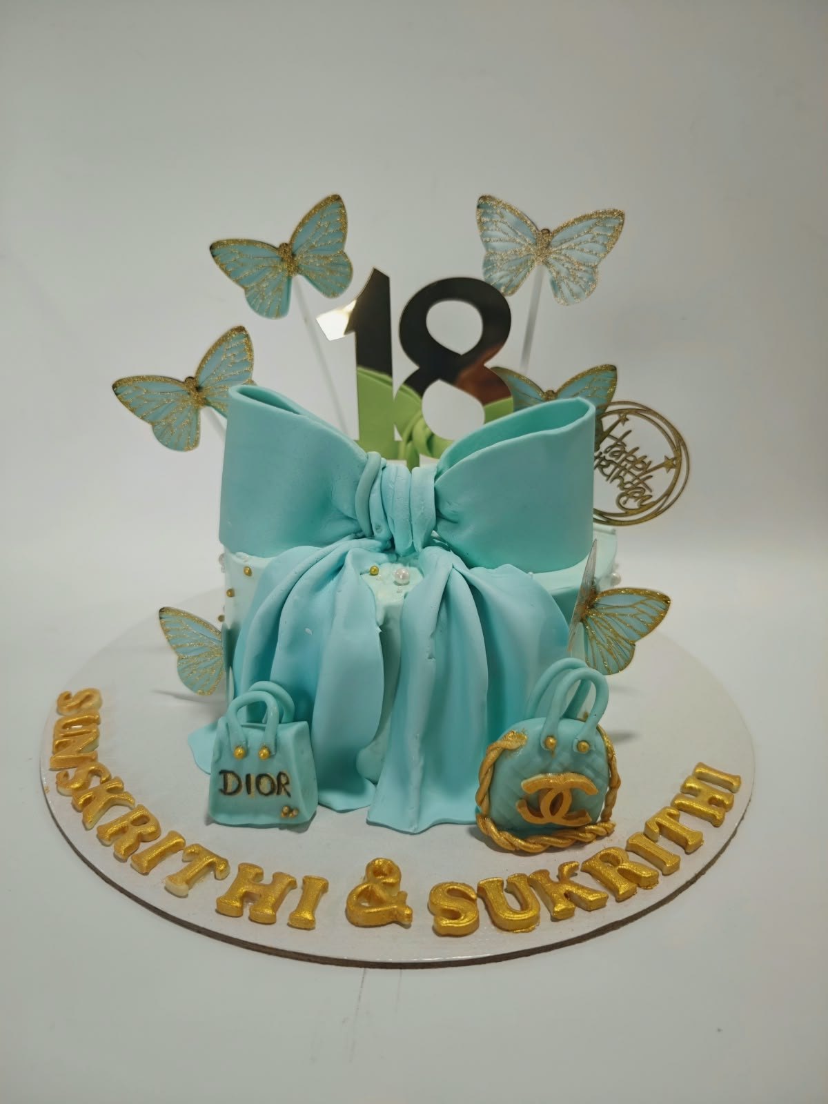 Turquoise Bow & Butterfly Cake